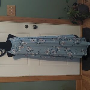Blue floral dress size large, high neck that gathered, string straps, flowy
